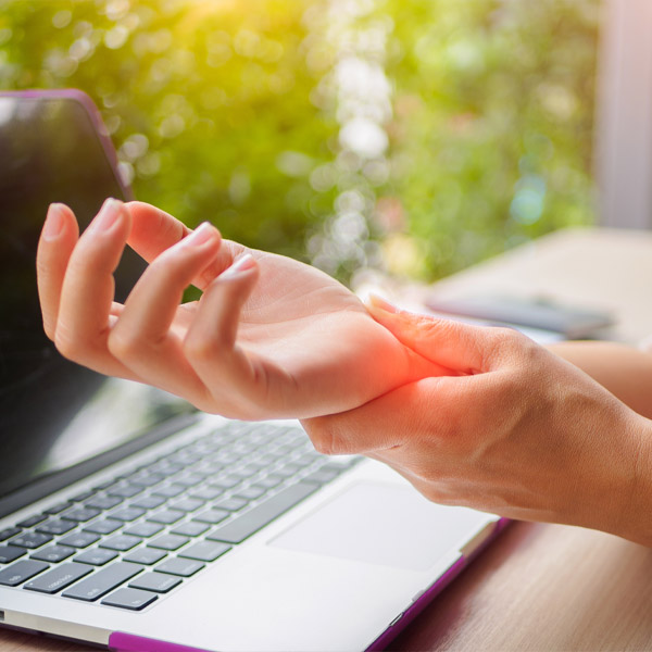 person holding wrist