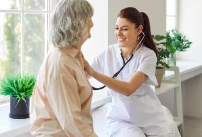 older woman being screened for cardiological services